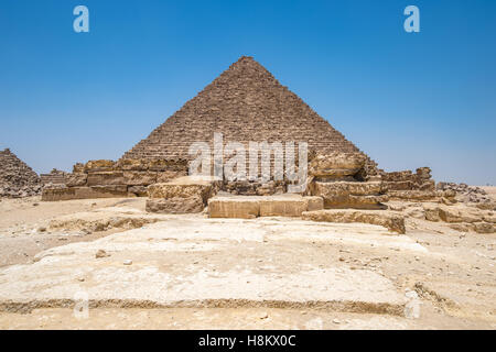 Cairo, Egypt One of the Great pyramids of Giza against a clear blue sky. This particular one is The Pyramid of Mekaure, the smal Stock Photo