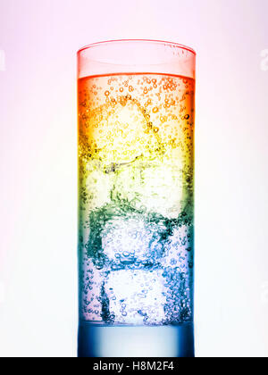 Colourful drink with ice cubes on white background Stock Photo