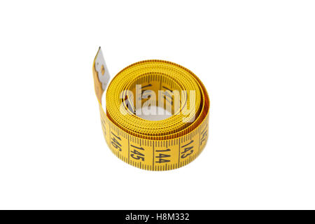 Measuring tape of tailor isolated on white background, close-up Stock Photo