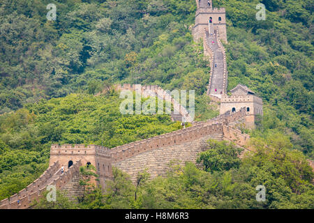 Mutianyu, China - Landscape view of the Great Wall of China. The wall stretches over 6,000 mountainous kilometers east to west a