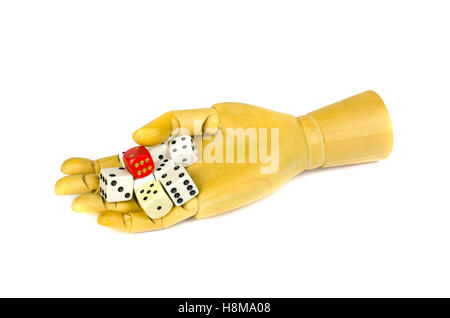 Wooden artist manikin hand with colorful bones dice of game,isolated on white Stock Photo