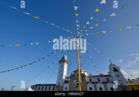 Colorful pennants at a festival in front of the Basilica de Nuestra Senora, Candelaria, Tenerife, Canary Islands, Spain Stock Photo