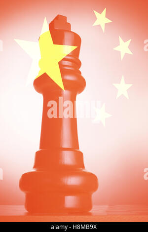 Chess pieces against Chinese Flag Stock Photo