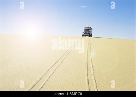 Car in hot desert Stock Photo