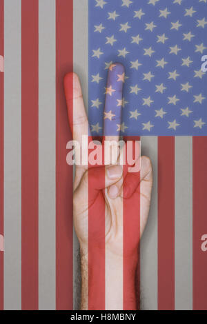 Peace sign over US flag Stock Photo