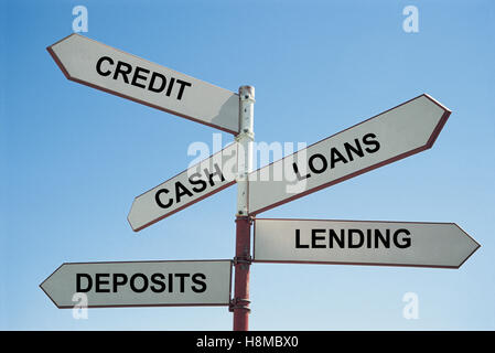 Signpost to banking Stock Photo