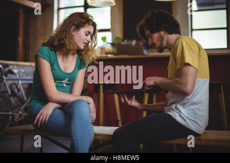 Couple using digital tablet Stock Photo