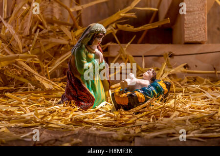 Christmas Manger scene with figurines including Jesus and Mary. Focus on Mary! Stock Photo