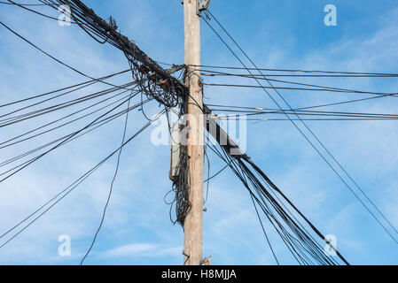 Telephone pole with cable wires Stock Photo