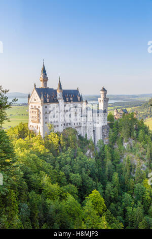 Classic view of world-famous Neuschwanstein Castle, one of Europe's most visited castles, at sunset, Bavaria, Germany Stock Photo