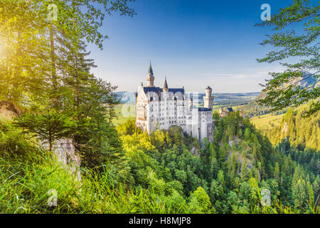 Classic view of world-famous Neuschwanstein Castle, one of Europe's most visited castles, at sunset, Bavaria, Germany Stock Photo