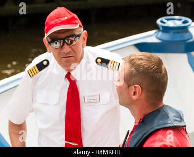 Travelmarvel Diamond Captain and member of crew , negotiating a lock on the Main River, Germany Stock Photo