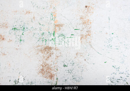 Grungy painted white background wall texture brown and green Stock Photo