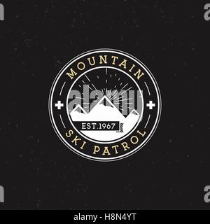 Camping Label. Vintage Mountain ski patrol round patch. Outdoor adventure logo design. Travel retro and hipster color insignia. Adventure badge design. Wilderness emblem and stamp. Vector design Stock Vector