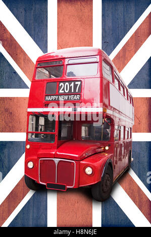 Happy new year 2017 written on a London vintage red bus, Union Jack background Stock Photo