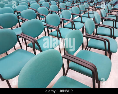 Row of chairs inside a congress room. Stock Photo