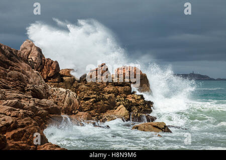 Stormy sea near Trégastel looking towards les Sept Îles, Côte de Granit Rose, Finistère, Brittany, France. Stock Photo