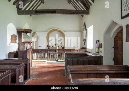 The interior of the Saxon church of St Faith in the Cotswold village of Farmcote, Gloucestershire UK Stock Photo