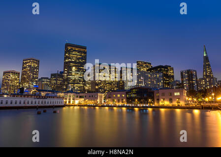 San Francisco skyline viewed from Pier 7 after sunset. Long exposure. Stock Photo