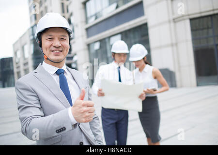 Confident Chinese architects Stock Photo