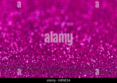 Purple sparkling background from small sequins, closeup. Brilliant and diamond backdrop. Stock Photo