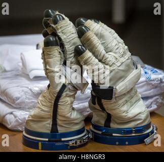 A pair of Russian Sokol suit gloves sit on a table during Soyuz qualification exams at the Gagarin Cosmonaut Training Center October 25, 2016 in Star City, Russia. Stock Photo