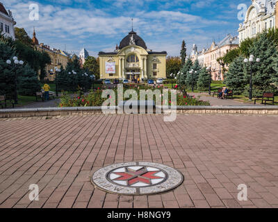 Front of Chernivtsi Drama Theatre with the gardens of Teatralna Square in front. Chernivtsi Oblast Ukraine Stock Photo