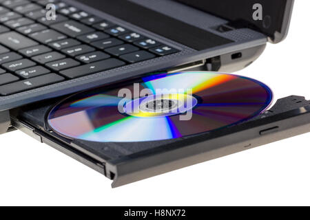 Electronic collection - Laptop with open DVD tray isolated on a white background Stock Photo