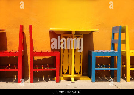 Colourful table & chairs ready for a street cafe or restaurant. Stock Photo