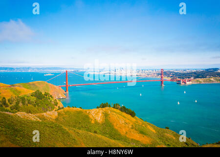 High angle, mid-air, aerial view of downtown San Francisco city, bay seen together with Golden Gate Bridge and hills of Marin he Stock Photo