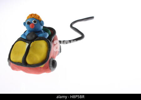 plasticine computer mouse car with a little man sat inside ideal logo Stock Photo