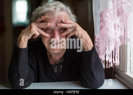 Portrait of funny elderly woman. Stock Photo