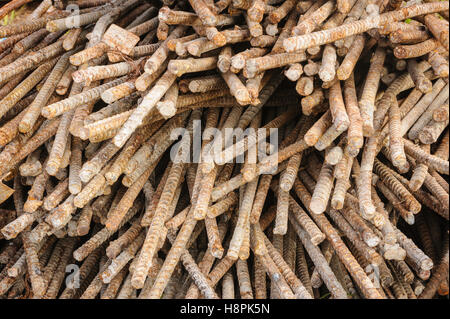 Rusty old rebar steel used in construction background texture. Stock Photo