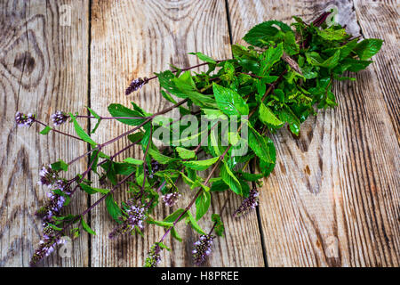 Mint Flowers on Wooden Rustik Background Stock Photo