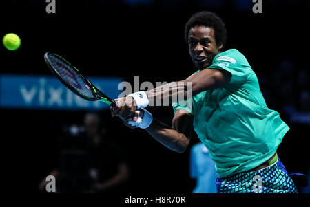 London, UK. 15th Nov, 2016. France's Gael Monfils returns against Austria's Dominic Thiem during their round robin stage men's singles match on day three of the ATP World Tour Finals tennis tournament in London on Nov. 15, 2016. Thiem won the match 2-1. Credit:  Tang Shi/Xinhua/Alamy Live News Stock Photo