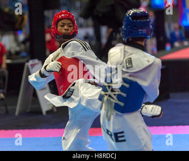 Burnaby, Canada. 16th Nov, 2016. WTF World Taekwondo Junior Championships, Georgios Ioannou (GRE) in blue and Darius Brown (CAN) in red compete in 48kg class Credit: © Peter Llewellyn/Alamy Live News  Stock Photo