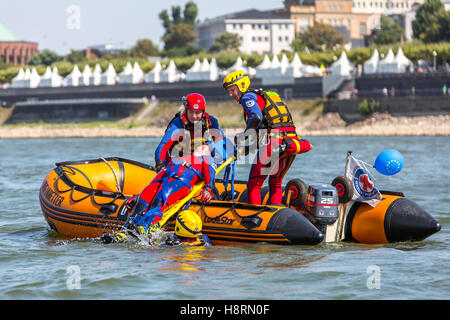Practice of water rescue units on the Rhine near Düsseldorf, rescue boats with rescue float, water guard, Germany Stock Photo
