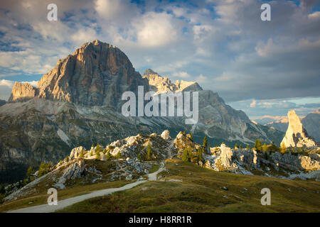 Evening sunlight over Tofana di Rozes and Cinque Torri, Dolomite Mountains, Veneto, Italy Stock Photo