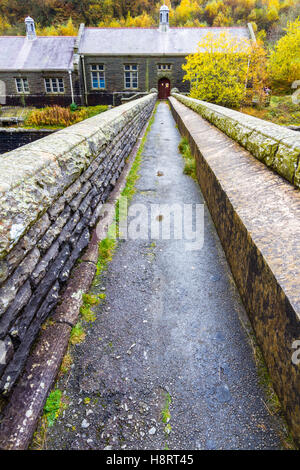 Bridge over the Elan River leading to one of two electricity generating stations. Below dam of Caban Coch reservoir, Rhayader, Stock Photo