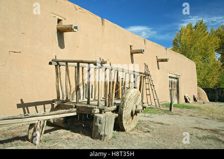 Wooden Cart and Hacienda de los Martinez, Taos, New Mexico USA Stock Photo