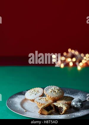 Mince pies and Christmas lights Stock Photo