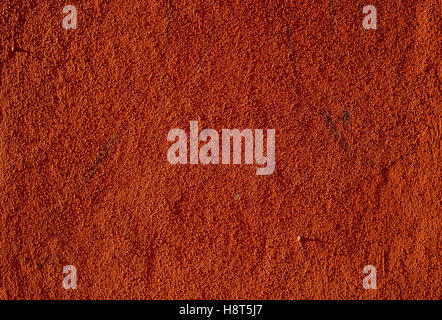 red plaster wall covering Stock Photo