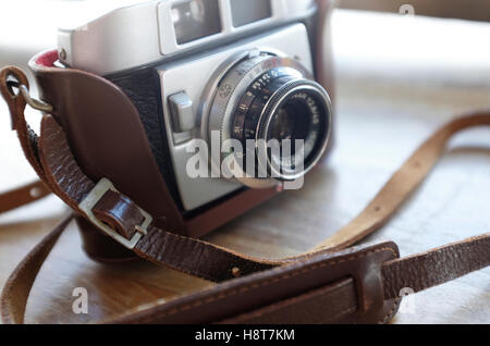 retro style vintage rangefinder camera in case Stock Photo