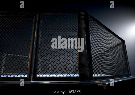 A 3D render of an MMA fight cage arena dressed in black padding spotlit by a single light on an isolated dark background Stock Photo