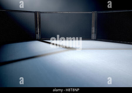 A 3D render of an MMA fight cage arena dressed in black padding spotlit by a single light on an isolated dark background Stock Photo