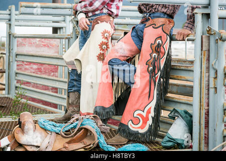 Taos, New Mexico, USA. Small town western rodeo. Cowboy leather chaps which help protect the rider. Stock Photo