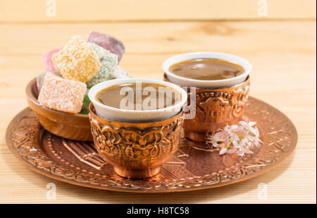 Coffee and Turkish delight in a copper kitchen utensils Stock Photo