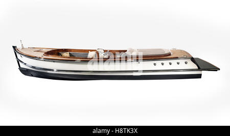 Vintage wooden boat with steering wheel and dashboard isolated on a white background Stock Photo