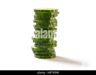 Sliced Cucumber in Stack of 20 isolated on white Stock Photo