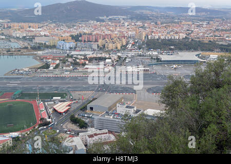 Aerial view from the Upper Rock of Gibraltar showing airport runway, border crossing and La Linea beyond Stock Photo